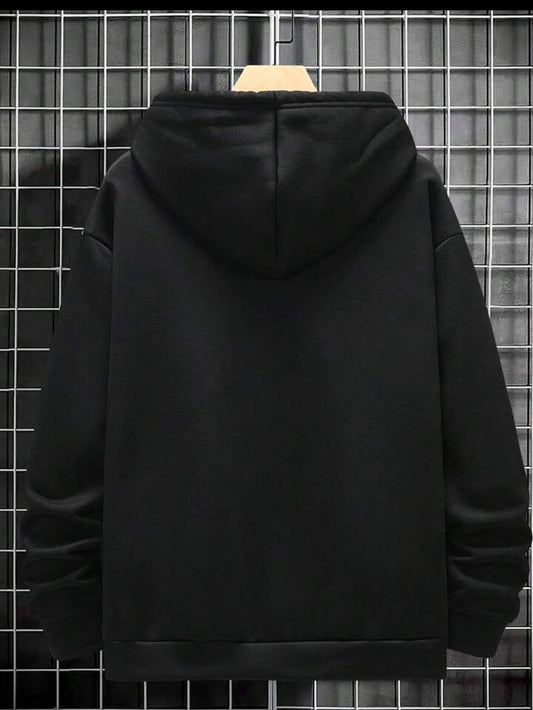 Black hoodie on hanger against metal grid wall, plain back, casual streetwear fashion