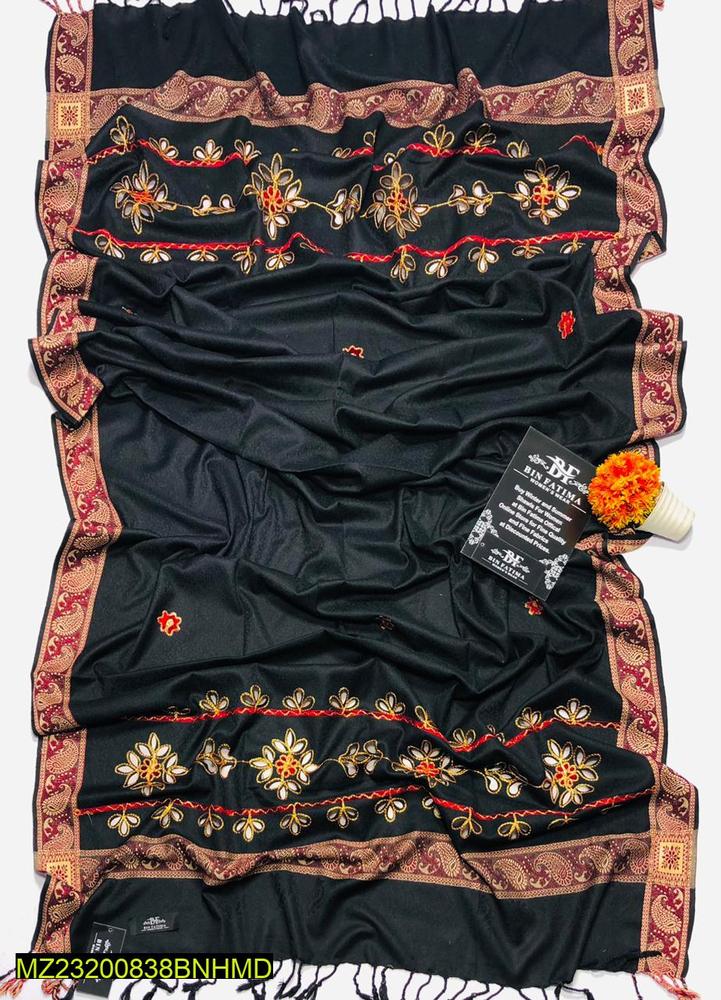 Black shawl with gold floral embroidery, red accents, and paisley border on white background