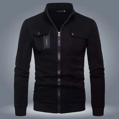Black zip-up jacket with stand collar and front flap pockets on a grey background