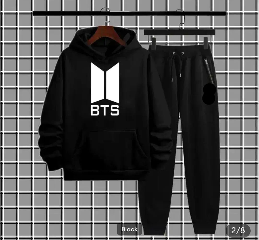 Black BTS logo hoodie and sweatpants set on checkered background