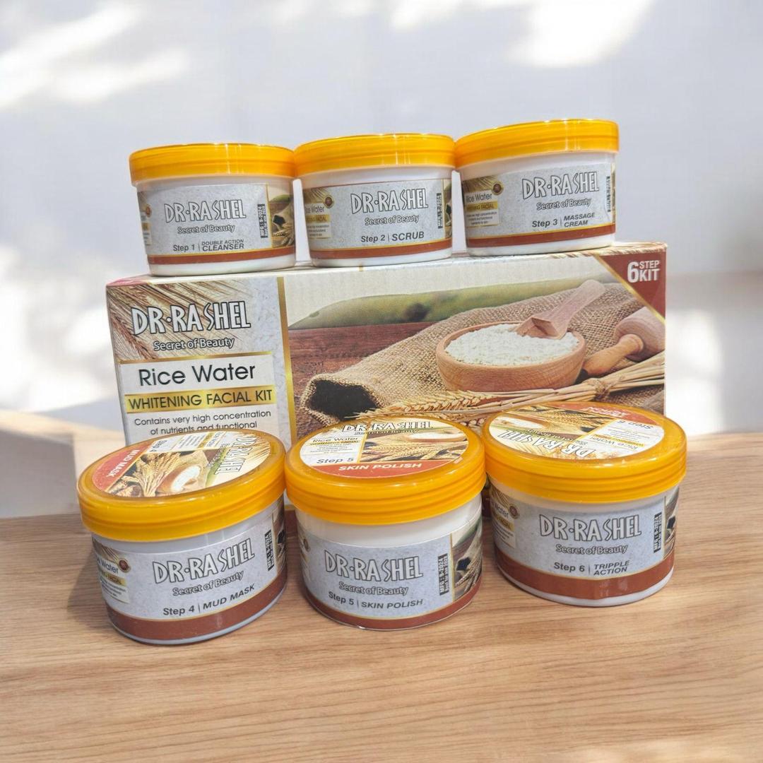 Dr Rashel Rice Water Whitening Facial Kit six-step set with yellow lids on wooden table