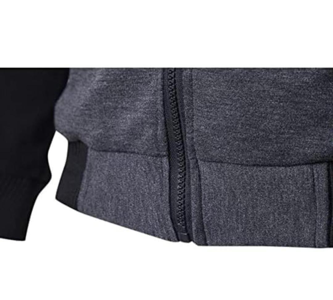 Close-up of dark grey zip-up hoodie with black sleeve detail