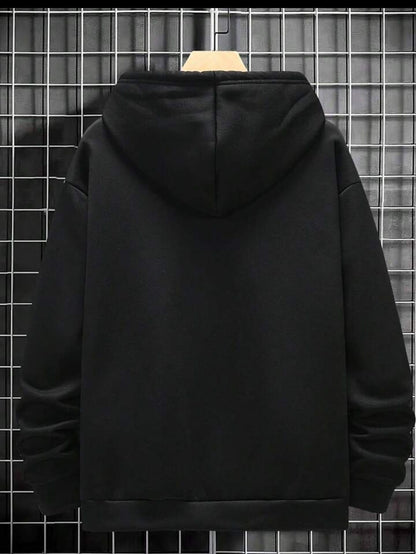 Black hoodie on hanger against metal grid wall, plain back, casual streetwear fashion
