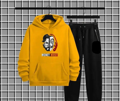 Yellow Money Heist hoodie and black joggers set on grid background