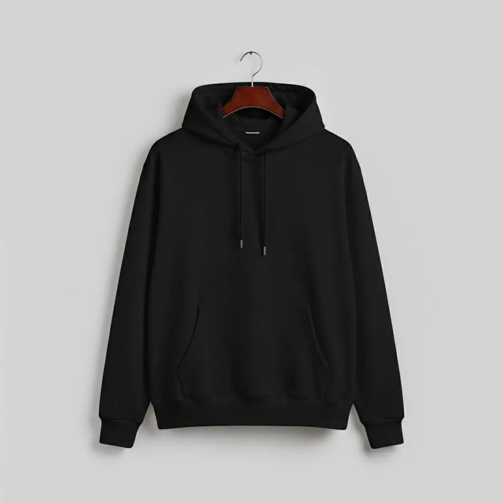 Black hoodie with front pocket and drawstrings on hanger against plain gray background