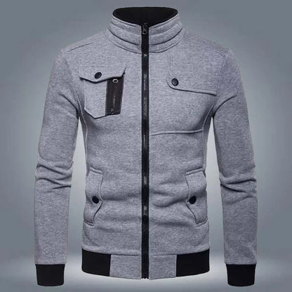 Gray men's zip-up jacket with high collar, chest pocket, and black trim accents